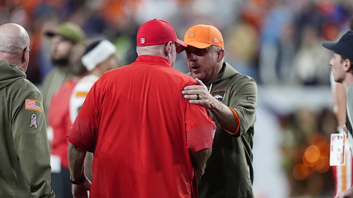 Nov 16, 2025; Denver, Colorado, USA; Denver Broncos head coach Sean Payton greets Kansas City Chiefs head coach Andy Reid following the game at Mile High. Mandatory Credit: Ron Chenoy-Imagn Images