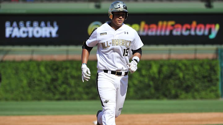 Aug 15, 2015; Chicago, IL, USA; National catcher Andy Yerzy (15) runs the bases after hitting a two-run home run against the American team during the second inning in the Under Armour All America Baseball game at Wrigley field. Mandatory Credit: David Banks-Imagn Images