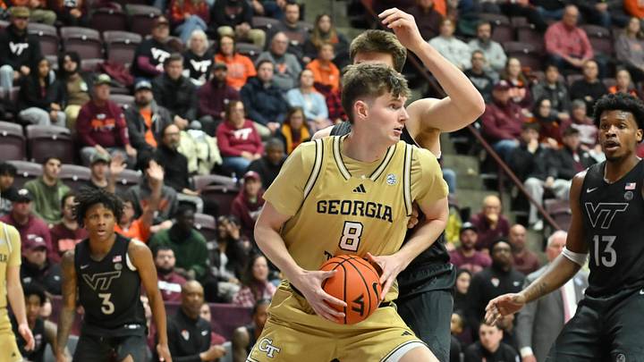 Jan 27, 2026; Blacksburg, Virginia, USA; Georgia Tech Yellow Jackets center Cole Kirouac (8) looks to pass the ball during the first half at Cassell Coliseum. Mandatory Credit: Brian Bishop-Imagn Images Jan 27, 2026; Blacksburg, Virginia, USA; Georgia Tech Yellow Jackets center Cole Kirouac (8) looks to pass the ball during the first half at Cassell Coliseum. Mandatory Credit: Brian Bishop-Imagn Images