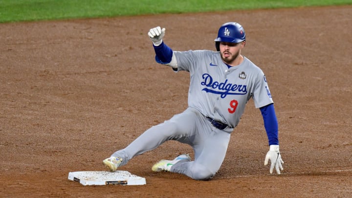 Oct 29, 2024; New York, New York, USA; Los Angeles Dodgers second baseman Gavin Lux (9) slides into second with a double during the second inning against the New York Yankees in game four of the 2024 MLB World Series at Yankee Stadium. Mandatory Credit: John Jones-Imagn Images Oct 29, 2024; New York, New York, USA; Los Angeles Dodgers second baseman Gavin Lux (9) slides into second with a double during the second inning against the New York Yankees in game four of the 2024 MLB World Series at Yankee Stadium. Mandatory Credit: John Jones-Imagn Images