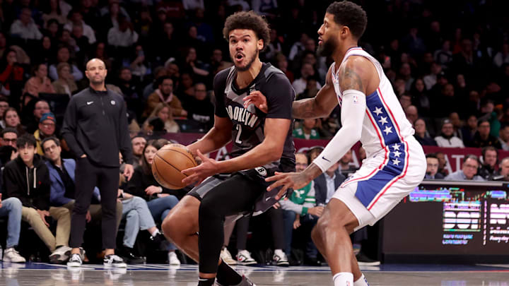 Feb 12, 2025; Brooklyn, New York, USA; Brooklyn Nets forward Cameron Johnson (2) controls the ball against Philadelphia 76ers forward Paul George (8) during the second quarter at Barclays Center. Mandatory Credit: Brad Penner-Imagn Images Feb 12, 2025; Brooklyn, New York, USA; Brooklyn Nets forward Cameron Johnson (2) controls the ball against Philadelphia 76ers forward Paul George (8) during the second quarter at Barclays Center. Mandatory Credit: Brad Penner-Imagn Images