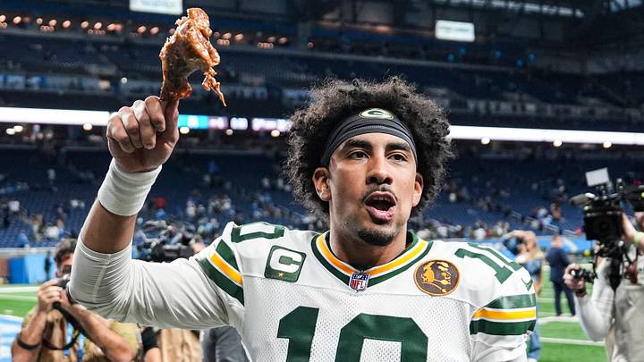 Green Bay Packers quarterback Jordan Love celebrates with a turkey leg after last year's win at Detroit.