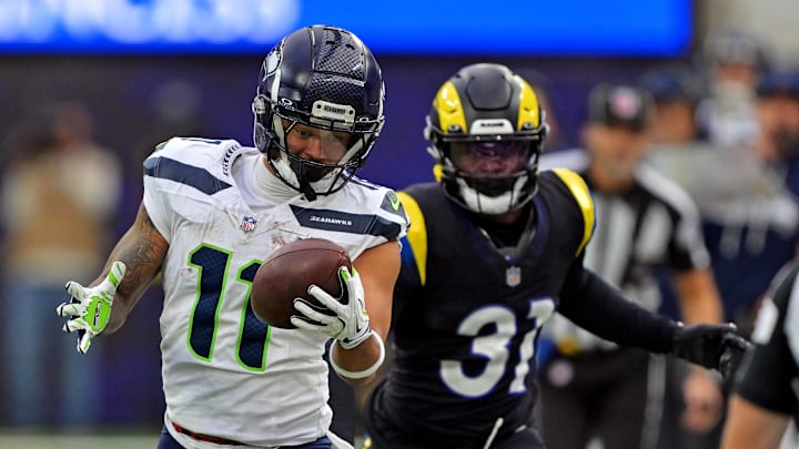 Nov 16, 2025; Inglewood, California, USA; Seattle Seahawks wide receiver Jaxon Smith-Njigba (11) makes a one handed catch against Los Angeles Rams cornerback Darious Williams (31) during the first half at SoFi Stadium. Mandatory Credit: Jayne Kamin-Oncea-Imagn Images