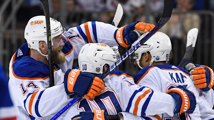 Dec 22, 2023; New York, New York, USA;  Edmonton Oilers celebrate the goal by Edmonton Oilers left