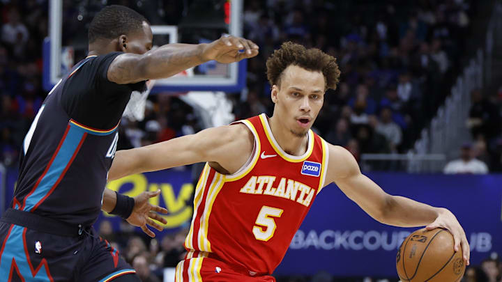 Mar 25, 2026; Detroit, Michigan, USA;  Atlanta Hawks guard Dyson Daniels (5) dribbles in the second half against the Detroit Pistons at Little Caesars Arena. Mandatory Credit: Rick Osentoski-Imagn Images