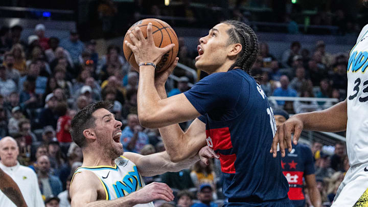 Nov 24, 2024; Indianapolis, Indiana, USA; Washington Wizards forward Kyshawn George (18) shoots the ball while Indiana Pacers guard T.J. McConnell (9) defends in the second half at Gainbridge Fieldhouse. Mandatory Credit: Trevor Ruszkowski-Imagn Images Nov 24, 2024; Indianapolis, Indiana, USA; Washington Wizards forward Kyshawn George (18) shoots the ball while Indiana Pacers guard T.J. McConnell (9) defends in the second half at Gainbridge Fieldhouse. Mandatory Credit: Trevor Ruszkowski-Imagn Images