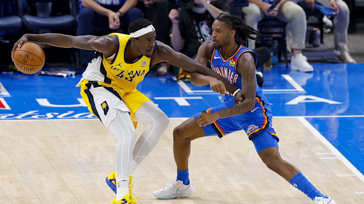 Jun 8, 2025; Oklahoma City, Oklahoma, USA; Indiana Pacers forward Pascal Siakam (43) looks to move the ball past Oklahoma City Thunder guard Cason Wallace (22) during the second quarter of game two of the 2025 NBA Finals at Paycom Center. Mandatory Credit: Alonzo Adams-Imagn Images