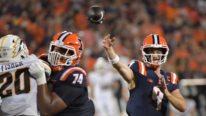 Sep 13, 2025; Champaign, Illinois, USA;  Illinois Fighting Illini quarterback Luke Altmyer (9) passes the ball during the second half against the Western Michigan Broncos at Memorial Stadium. Mandatory Credit: Ron Johnson-Imagn Images