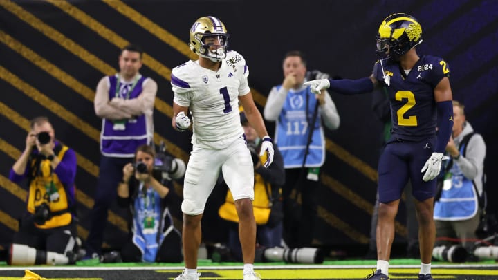 Jan 8, 2024; Houston, TX, USA; Washington Huskies wide receiver Rome Odunze (1) and Michigan Wolverines defensive back Will Johnson (2) react after a flag was thrown during the fourth quarter in the 2024 College Football Playoff national championship game at NRG Stadium. Mandatory Credit: Thomas Shea-USA TODAY Sports