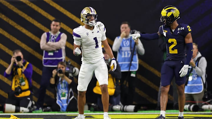 Jan 8, 2024; Houston, TX, USA; Washington Huskies wide receiver Rome Odunze (1) and Michigan Wolverines defensive back Will Johnson (2) react after a flag was thrown during the fourth quarter in the 2024 College Football Playoff national championship game at NRG Stadium. Mandatory Credit: Thomas Shea-Imagn Images