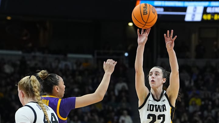 Apr 1, 2024; Albany, NY, USA; Iowa Hawkeyes guard Caitlin Clark (22) shoots against LSU Lady Tigers