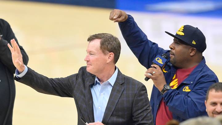 Jan 4, 2020; Cleveland, Ohio, USA; Former Cleveland Cavaliers point guard Mark Price, left, reacts to fans in the first quarter of a game between the Cleveland Cavaliers and the Oklahoma City Thunder at Rocket Mortgage FieldHouse. Mandatory Credit: David Richard-USA TODAY Sports