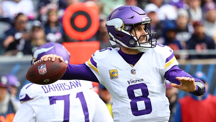 Oct 15, 2023; Chicago, Illinois, USA; Minnesota Vikings quarterback Kirk Cousins (8) drops back to