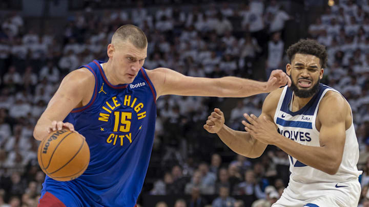 May 10, 2024; Minneapolis, Minnesota, USA; Denver Nuggets center Nikola Jokic (15) drives to the