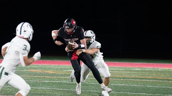 Oct 24, 2025; Allendale, NJ, USA; Ramapo football at Northern Highlands. NH #4 Jack O’Callaghan tries to avoid a tackle by R #53 Luke Gruba.