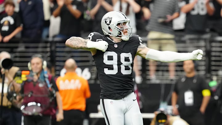 Oct 12, 2025; Paradise, Nevada, USA; Las Vegas Raiders defensive end Maxx Crosby (98) reacts after a play during the second half against the Tennessee Titans at Allegiant Stadium. Mandatory Credit: Stephen R. Sylvanie-Imagn Images