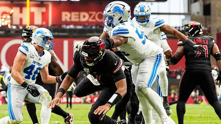 Detroit Lions defensive lineman Alim McNeill (54) tackles Arizona Cardinals quarterback Jacoby Brissett (7) during the first half at State Farm Stadium in Glendale, Arizona on Sunday, Oct. 11, 2026. Detroit Lions defensive lineman Alim McNeill (54) tackles Arizona Cardinals quarterback Jacoby Brissett (7) during the first half at State Farm Stadium in Glendale, Arizona on Sunday, Oct. 11, 2026.