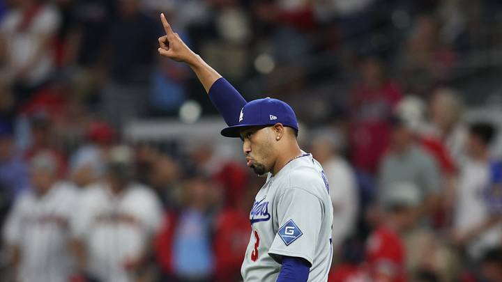 Oct 7, 2026; Cumberland, Georgia, USA;  Los Angeles Dodgers pitcher Edwin Diaz (3) celebrates after defeating the Atlanta Braves in game four of the NLDS for the 2026 MLB Playoffs at Truist Park.  Mandatory Credit: Brett Davis-Imagn Images
