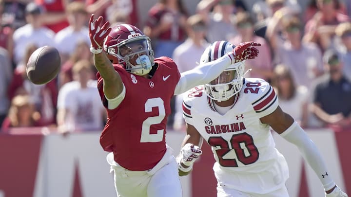 Oct 12, 2024; Tuscaloosa, Alabama, USA;  A long pass to Alabama Crimson Tide wide receiver Ryan Williams (2) falls off his fingertips as he is defended by South Carolina Gamecocks defensive back Judge Collier (20) at Bryant-Denny Stadium. 