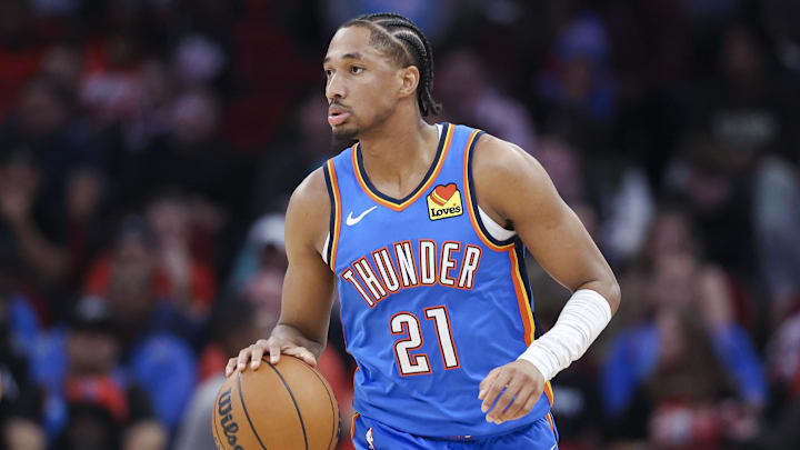 Dec 1, 2024; Houston, Texas, USA; Oklahoma City Thunder guard Aaron Wiggins (21) dribbles the ball during the game against the Houston Rockets at Toyota Center. Mandatory Credit: Troy Taormina-Imagn Images Dec 1, 2024; Houston, Texas, USA; Oklahoma City Thunder guard Aaron Wiggins (21) dribbles the ball during the game against the Houston Rockets at Toyota Center. Mandatory Credit: Troy Taormina-Imagn Images