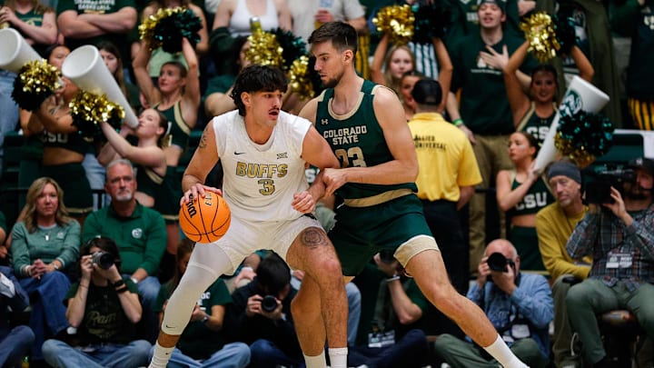 Dec 6, 2025; Fort Collins, Colorado, USA; Colorado Buffaloes forward Alon Michaeli (3) controls the ball as Colorado State Rams forward Nikola Djapa (23) guards in the first half at Moby Arena. Mandatory Credit: Isaiah J. Downing-Imagn Images Dec 6, 2025; Fort Collins, Colorado, USA; Colorado Buffaloes forward Alon Michaeli (3) controls the ball as Colorado State Rams forward Nikola Djapa (23) guards in the first half at Moby Arena. Mandatory Credit: Isaiah J. Downing-Imagn Images