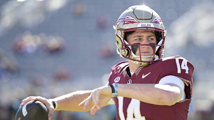 Nov 23, 2024; Tallahassee, Florida, USA; Florida State Seminoles quarterback Luke Kromenhoek (14) warms up before the game against the Charleston Southern Buccaneers at Doak S. Campbell Stadium. Mandatory Credit: Melina Myers-Imagn Images Nov 23, 2024; Tallahassee, Florida, USA; Florida State Seminoles quarterback Luke Kromenhoek (14) warms up before the game against the Charleston Southern Buccaneers at Doak S. Campbell Stadium. Mandatory Credit: Melina Myers-Imagn Images