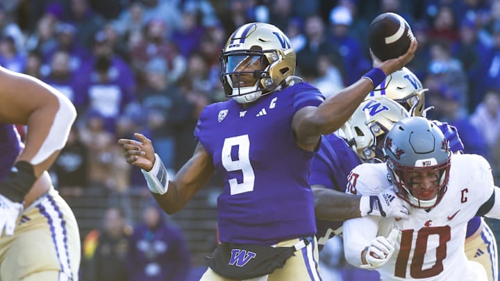 Nov 25, 2023; Seattle, Washington, USA; Washington Huskies quarterback Michael Penix Jr. (9) passes