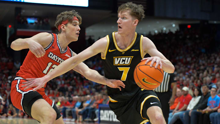 Mar 8, 2024; Dayton, Ohio, USA;  Virginia Commonwealth Rams guard Sean Bairstow (7) battles with