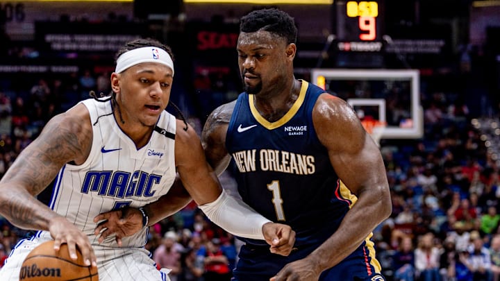Mar 13, 2025; New Orleans, Louisiana, USA; Orlando Magic forward Paolo Banchero (5) dribbles against New Orleans Pelicans forward Zion Williamson (1) during the first half at Smoothie King Center. Mandatory Credit: Stephen Lew-Imagn Images Mar 13, 2025; New Orleans, Louisiana, USA; Orlando Magic forward Paolo Banchero (5) dribbles against New Orleans Pelicans forward Zion Williamson (1) during the first half at Smoothie King Center. Mandatory Credit: Stephen Lew-Imagn Images