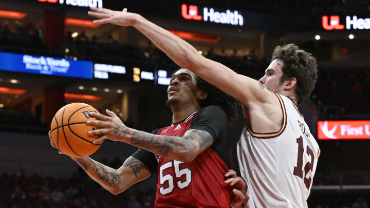 Mar 9, 2024; Louisville, Kentucky, USA;  Louisville Cardinals guard Skyy Clark (55) strives for a layup.