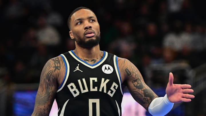 Dec 10, 2024; Milwaukee, Wisconsin, USA; Milwaukee Bucks guard Damian Lillard (0) reacts in the third quarter against the Orlando Magic at Fiserv Forum. Mandatory Credit: Benny Sieu-Imagn Images