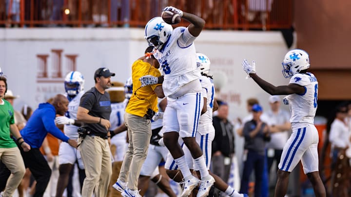 Nov 23, 2024; Austin, Texas, USA; Kentucky Wildcats defensive tackle Deone Walker (0) celebrates a recovered fumble against the Texas Longhorns during the third quarter at Darrell K Royal-Texas Memorial Stadium. 