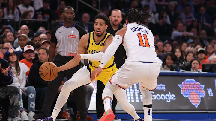 Indiana Pacers guard Tyrese Haliburton (0) controls the ball against New York Knicks guard Jalen Brunson. Indiana Pacers guard Tyrese Haliburton (0) controls the ball against New York Knicks guard Jalen Brunson.