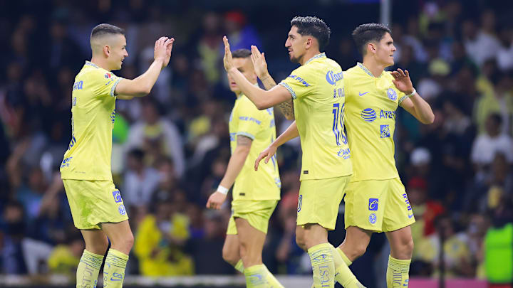 Jugadores de América celebran un gol. Jugadores de América celebran un gol.