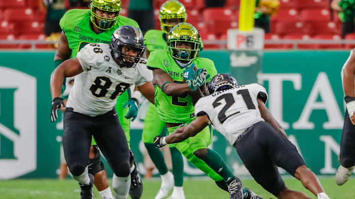 In this 2020 "War On I-4" battle between USF and UCF, defensive lineman Josh Celiscar (88) did his best to help the Knights win. Now, Celiscar will do the  same, but this time it's for the Bulls.