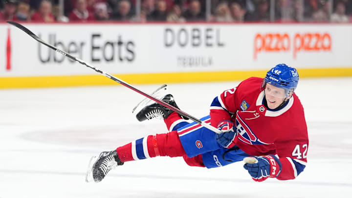Dec 16, 2025; Montreal, Quebec, CAN; Montreal Canadians defenseman Adam Engstrom (42) takes a shot on net during the first period of the game against the Philadelphia Flyers at the Bell Centre. Mandatory Credit: Eric Bolte-Imagn Images
