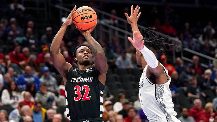 Cincinnati Bearcats forward Jalen Celestine (32) shoots from three point range in the second half of the second round of the Phillips 66 Big 12 Men’s Basketball Tournament between the Cincinnati Bearcats and UCF Knights, Wednesday, March 11, 2026, at T-Mobile Center in Kansas City, MO. Bearcats fall to the Knights 66-65 in overtime.