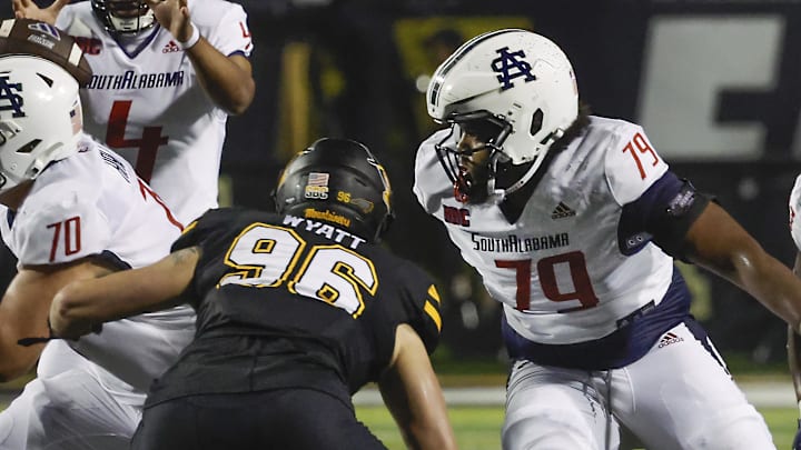 Sep 19, 2024; Boone, North Carolina, USA;  Appalachian State Mountaineers defensive end Josiah Wyatt (96) rushes the line toward South Alabama Jaguars offensive lineman Jordan Davis (79) during the second half at Kidd Brewer Stadium. Mandatory Credit: Reinhold Matay-Imagn Images