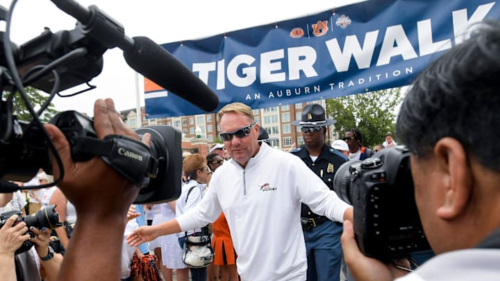 Auburn Tigers head coach Hugh Freeze takes part in the Tiger Walk before the UMass game at