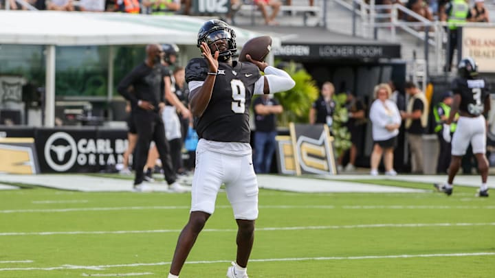 Sep 16, 2023; Orlando, Florida, USA; UCF Knights quarterback Timmy McClain (9) warms up before the