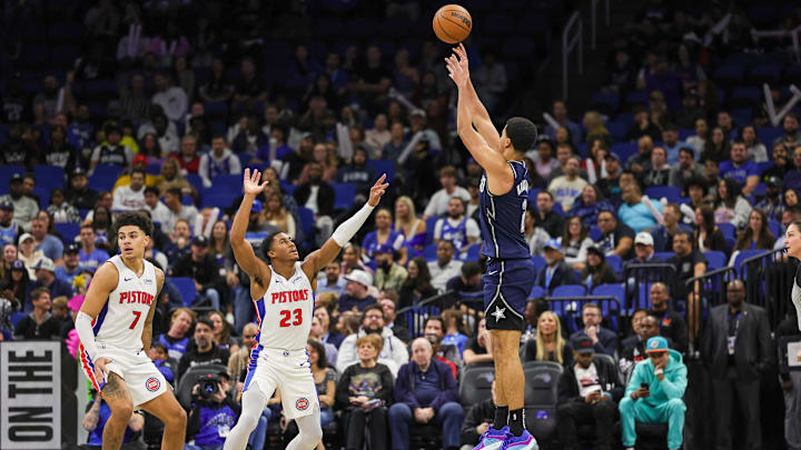 Dec 8, 2023; Orlando, Florida, USA; Orlando Magic guard Caleb Houstan (2) shoots the ball against