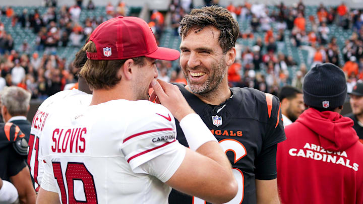 Dec 28, 2025; Cincinnati, Ohio, USA; Cincinnati Bengals quarterback Joe Flacco (16) and Arizona Cardinals quarterback Kedon Slovis (19) talk after the game at Paycor Stadium. Mandatory Credit: Frank Bowen IV-USA TODAY Network via Imagn Images