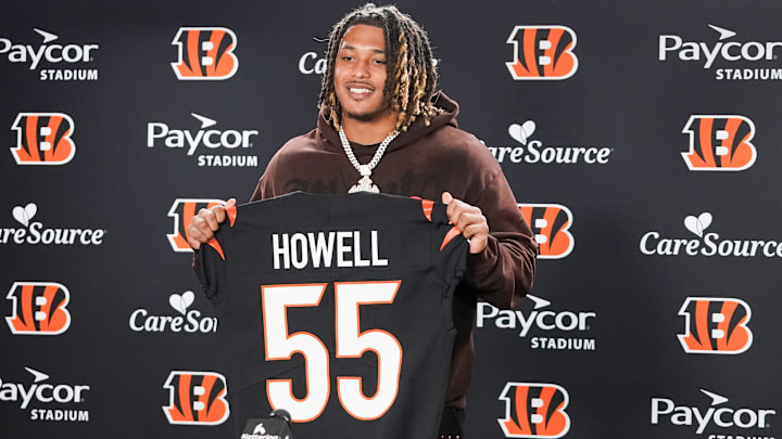 Cincinnati Bengals third round pick Tacario Davis holds his jersey at a press conference during the 2026 NFL Draft, Saturday, April 25, 2026, at Paycor Stadium in downtown Cincinnati.