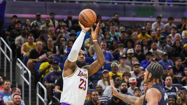 Nov 4, 2023; Orlando, Florida, USA; Los Angeles Lakers forward LeBron James (23) shoots the ball over Orlando Magic forward Paolo Banchero (5) during the first quarter at Amway Center. Mandatory Credit: Mike Watters-Imagn Images Nov 4, 2023; Orlando, Florida, USA; Los Angeles Lakers forward LeBron James (23) shoots the ball over Orlando Magic forward Paolo Banchero (5) during the first quarter at Amway Center. Mandatory Credit: Mike Watters-Imagn Images