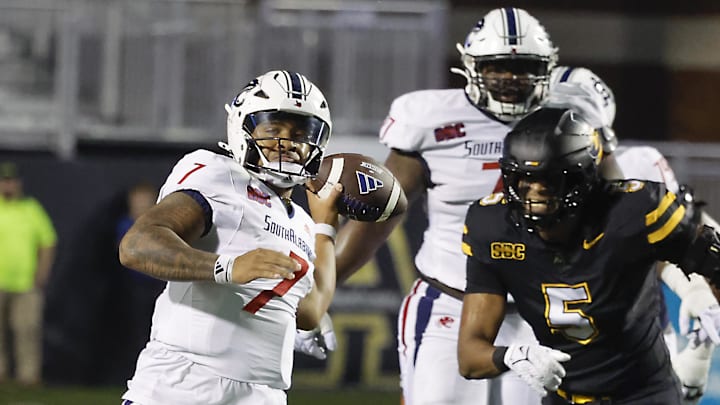 Sep 19, 2024; Boone, North Carolina, USA; South Alabama Jaguars quarterback Gio Lopez (7) throws on the run under pressure from Appalachian State Mountaineers defensive end Michael Fletcher (5) during the first quarter at Kidd Brewer Stadium. Mandatory Credit: Reinhold Matay-Imagn Images Sep 19, 2024; Boone, North Carolina, USA; South Alabama Jaguars quarterback Gio Lopez (7) throws on the run under pressure from Appalachian State Mountaineers defensive end Michael Fletcher (5) during the first quarter at Kidd Brewer Stadium. Mandatory Credit: Reinhold Matay-Imagn Images