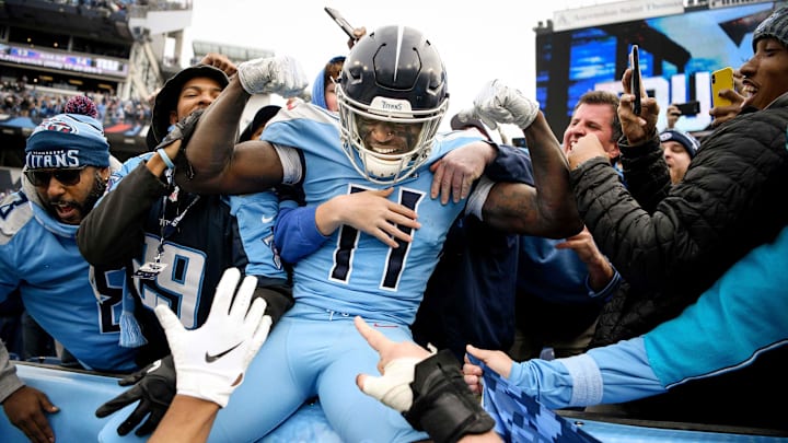 Tennessee Titans wide receiver A.J. Brown (11) celebrates with fans after scoring a touchdown against the Houston Texans during the fourth quarter at Nissan Stadium on Dec. 15, 2019.