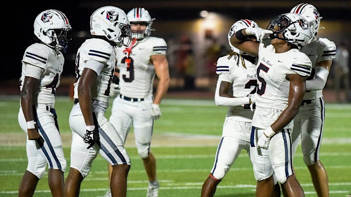 Pike Road's Braylon Outlaw (5) celebrates making an interception against Wetumpka during their game in Wetumpka, Ala., on Friday September 12, 2025.