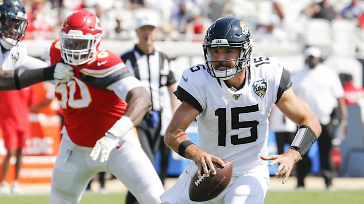 Sep 8, 2019; Jacksonville, FL, USA; Kansas City Chiefs defensive end Emmanuel Ogbah (90) chases Jacksonville Jaguars quarterback Gardner Minshew (15) out of the pocket during the second half at TIAA Bank Field. Mandatory Credit: Reinhold Matay-Imagn Images