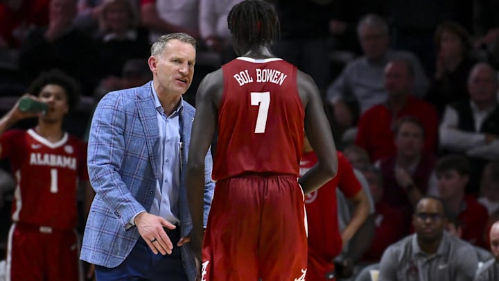 Jan 7, 2026; Nashville, Tennessee, USA;  Alabama Crimson Tide head coach Nate Oats talks with forward Taylor Bol Bowen (7) as he comes off the court during the second half at Memorial Gymnasium. Mandatory Credit: Steve Roberts-Imagn Images