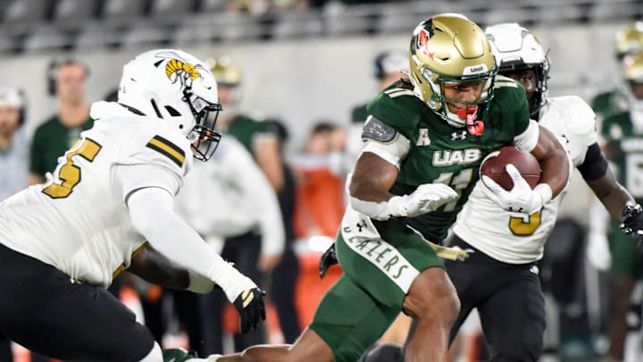 University of Alabama at Birmingham running back Solomon Beebe (11) carries the ball against Alabama State during their game at Protective Stadium in Birmingham Ala., on Thursday evening August 27, 2025.